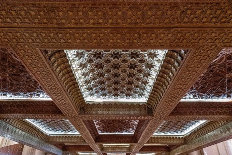 Casablanca, Morocco, 29 March, 2024: intricately carved cedar ceiling of the mezzanine in the