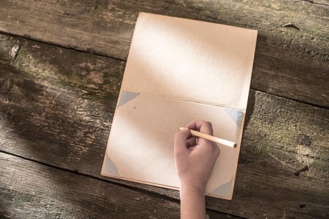 Vintage pencil and drawing paper. Weak sunlight
