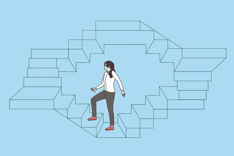 Work, career and success business concept. Young business woman walking up endless stairs on circle