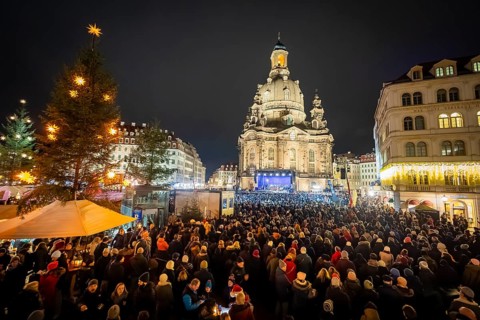 32nd Christmas Vespers and historic Christmas market on Neumarkt square in front of the