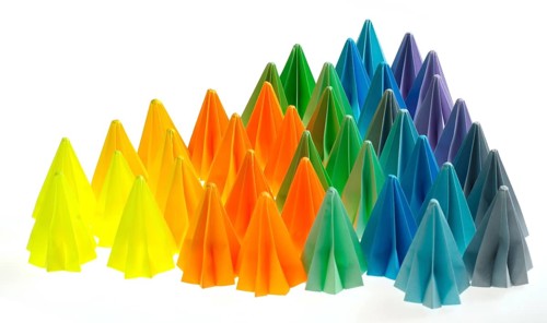 Colorful origami flower units isolated on white triangle shared like rainbow