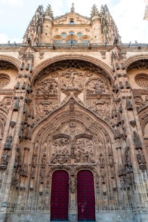 Main facade in plateresque style of the Cathedral of Salamanca. Castilla Leon, Spain
