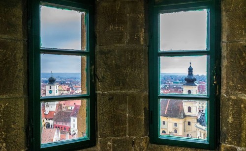 Sibiu Council Tower and Holy Trinity Roman Catholic Church viewed from the Evangelical Church