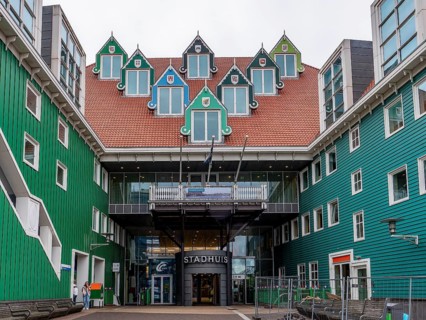 Green town hall (Stadhuis Zaanstad) with interesting 7 triangular pointed dormer windows, Zaandam,