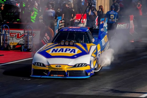 NHRA driver, Ron Capps, prepares to qualify for the Dodge Power Brokers NHRA Mile-High Nationals in