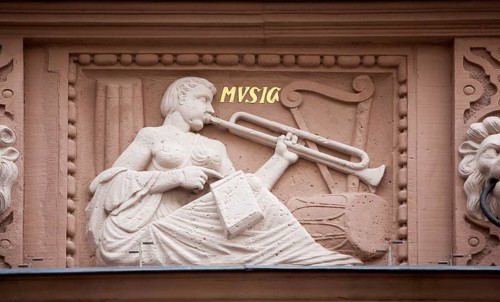 Trombone player, decoration of the facade, Town Hall, Lemgo, North Rhine-Westphalia, Germany
