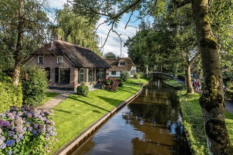 Giethoorn, Netherlands, August 5, 2016: The village Giethoorn is unique in the Netherlands because