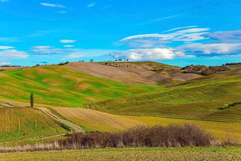 Travel to Tuscany. Sunny day at the beginning of winter. The famous picturesque and harmonious