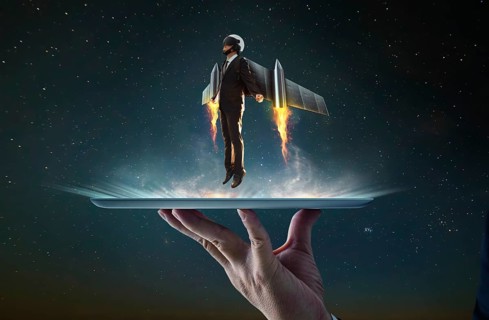 Waiter hand holding an empty digital tablet with Businessman wear a rocket suit to lift, Business