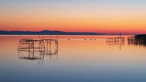 Panorama of Lake Balaton at sunrise near Balatonfenyves