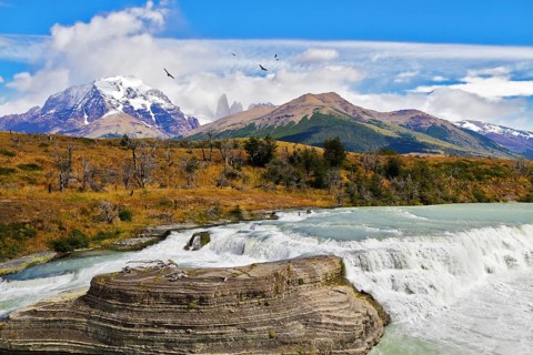 South of Chile. Scenic powerful and high-water waterfall Cascades Paine in the national park Torres