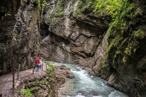 Hiking through the scenic Partnach gorge near Garmisch-Partenkirchen in the Bavarian Alps, Germany