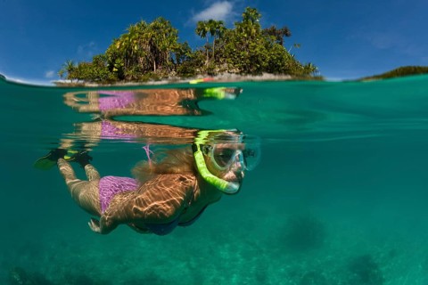 Woman snorkelling in Palau, Micronesia, Palau