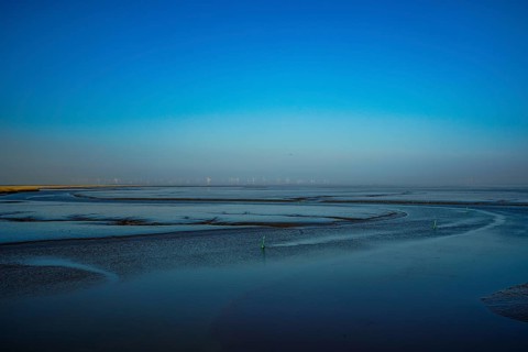 Tranquil waterscape with minimalist horizon under a blue sky, 9688 TN Drieborg, Dollart,
