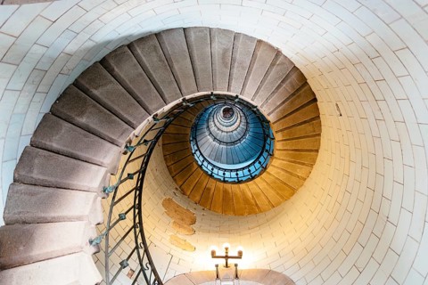 Penmarch, France, August 2, 2018: Spiral staircase in Eckmuhl Lighthouse in Brittany. Directly