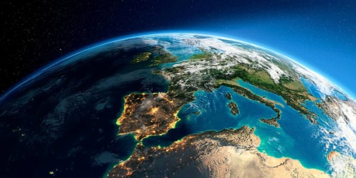 Highly detailed Earth with atmosphere, exaggerated relief and light-flooded cities. Transition from