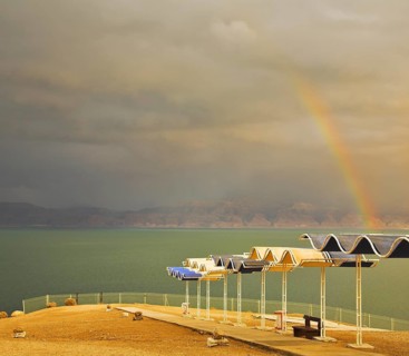 Magnificent rainbow during a spring thunder-storm on the Dead Sea