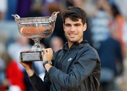 French Open 2024 winner Carlos Alcaraz with the trophy at Roland Garros, Paris, France.