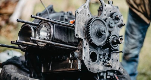 Detailed view of a disassembled engine with visible gears and components
