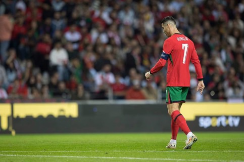 Football match, Captain Cristiano RONALDO CR7 Portugal walking to the left looking down and wearing