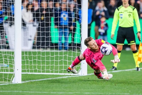 MELBOURNE, AUSTRALIA, MAY 22: Mark Gillespie Newcastle United saves a penalty against Tottenham