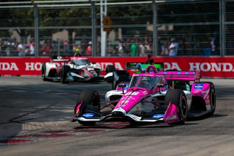 HELIO CASTRONEVES (06) of Sao Paulo, Brazil runs through the streets during the Honda Indy Toronto