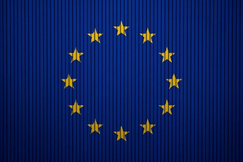 European Union Flag painted on the cracked grunge concrete wall