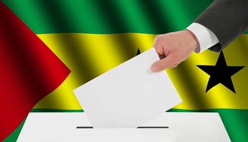 The São Tomé and Príncipe flag and the hand with the bulletin about the ballot box
