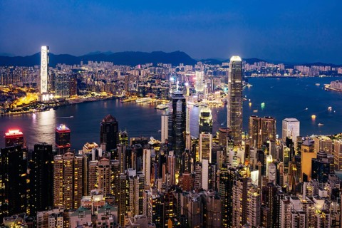 HONG KONG, CHINA - SEPTEMBER 29, 2024: Iconic view around sunset from Lugard Rd Lookout which