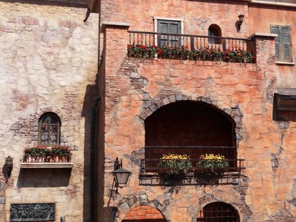 Antique Italian architecture details, old house balconies and windows with flowers