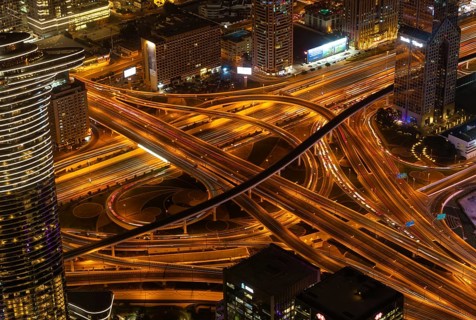 A picture of the busy Al Safa Street and Sheikh Zayed road intersection at night
