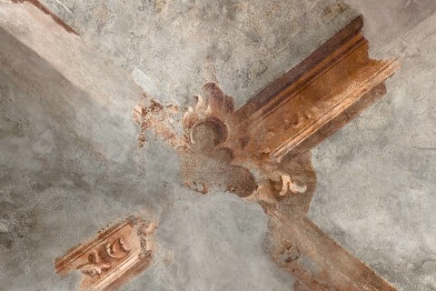 Antique ceiling of a church decorated with fresco vaulted