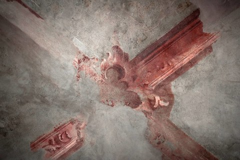 Antique ceiling of a church decorated with fresco vaulted