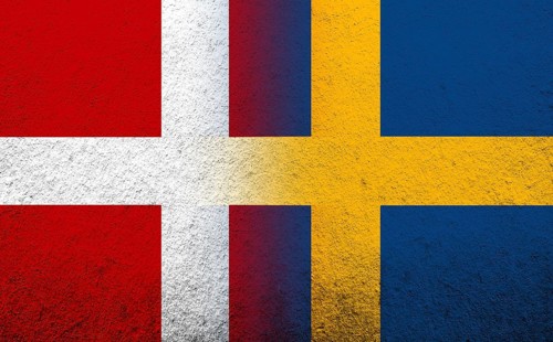 The Kingdom of Denmark National flag with The Kingdom of Sweden national flag. Grunge Background