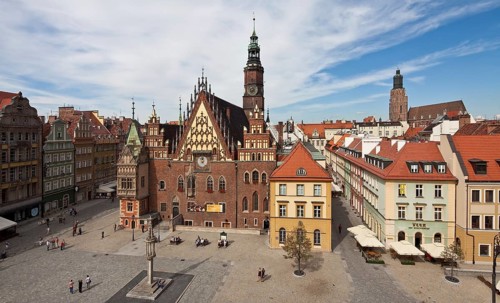 View from the east, tracery gable around 1500, astronomical clock 1580, Gothic oriel of the town
