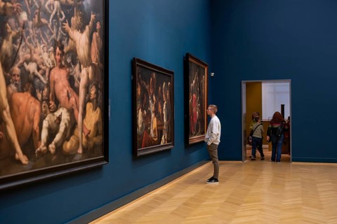 Copenhagen, Denmark, January 20, 2024: A visitor looking at paintings inside the National Gallery