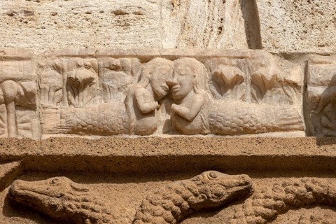 San Quirico d' Orcia, Collegiata, west portal, detail of the tympanum, siren