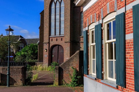 Old church with magnificent brick façade in the centre of the village, bredevoort, gelderland, the