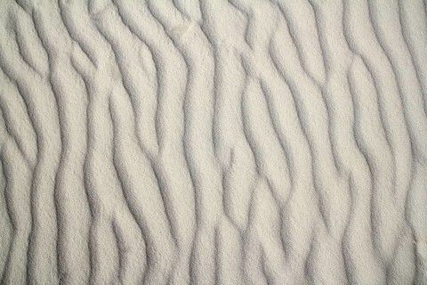 Caribbean sand waves desert pattern background beige