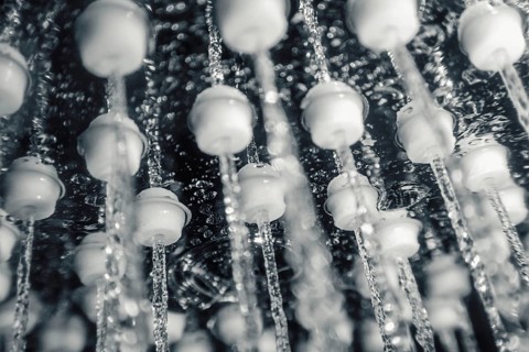 Shower head with running water closeup