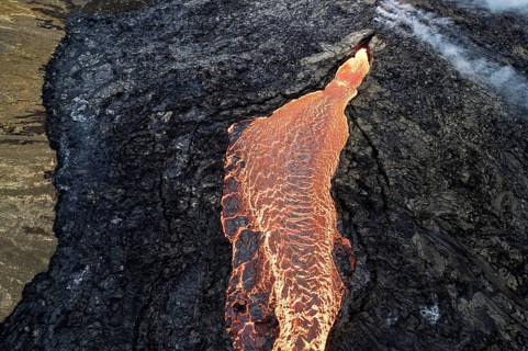 Drone image of glowing lava in Grindavik, Sudurnes, Iceland