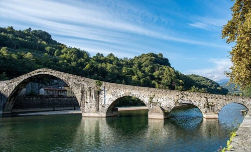 The Devils bridge or Ponte della Maddalena above Serchio river at Bongo a Mozzani town in Tuscany,