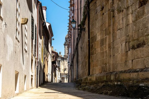 Old street with no people in medieval town of Santiago de Compostela