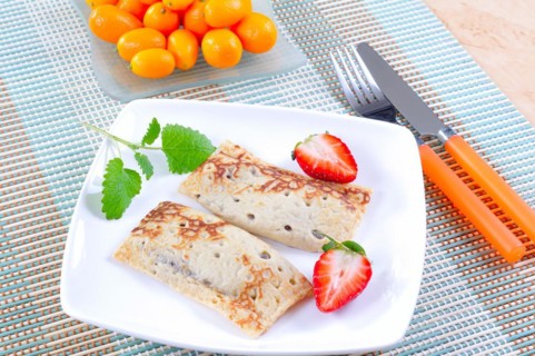 Sweet crepes with strawberries