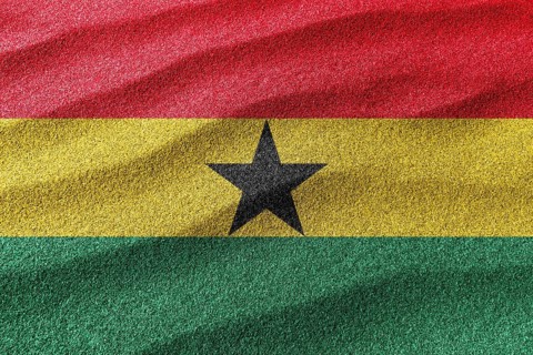 Ghana sand flag, national flag sand background