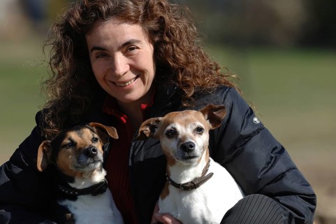 Woman with two Jack Russell terriers