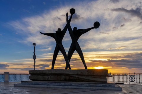 Taranto, Italy, 30 November, 2023: view of the Sailor Monument at the harbor entrance of Taranto at