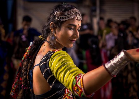 Woman participating in a traditional Garba dance, Udaipur, Rajasthan, Denmark