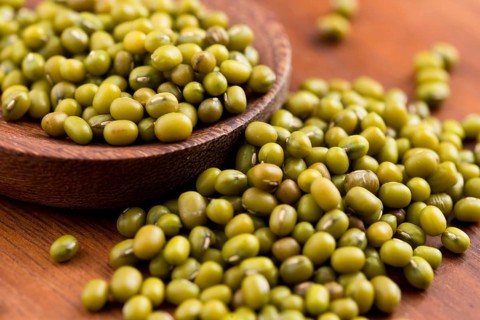 Mung beans over wooden spoon, lodz, poland