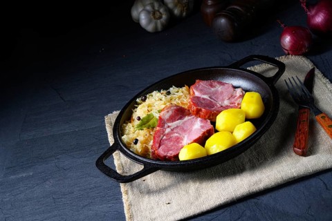 Cooked sauerkraut and delicious pork saddle